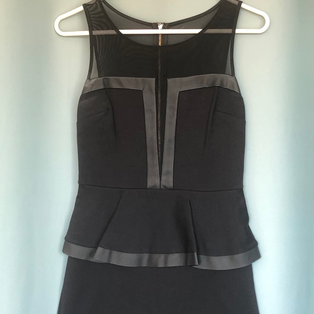 BEBE Black, faux leather trim, peplum mini dress